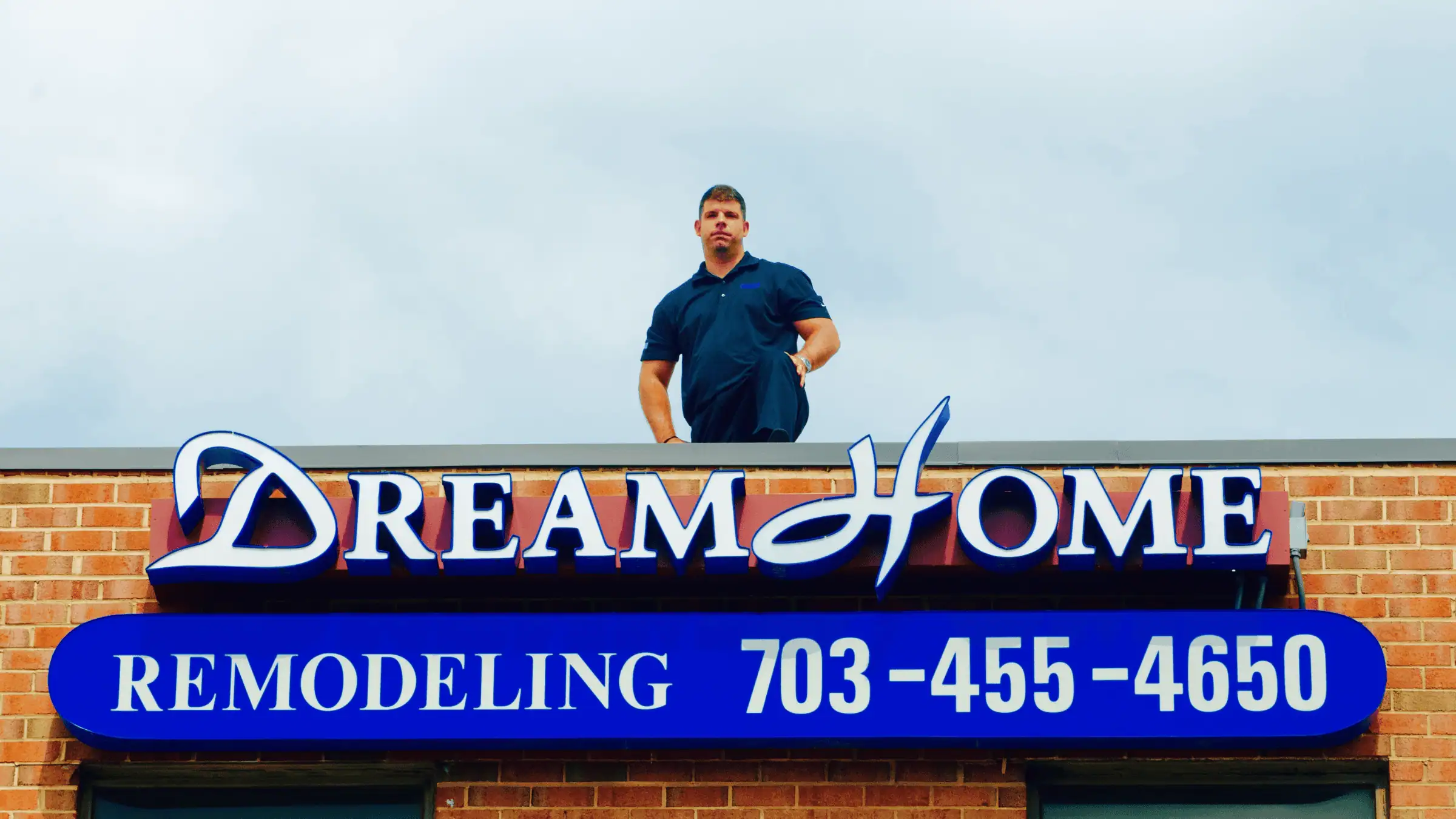DreamHome's founder on the original Springfield, VA office rooftop in 1999